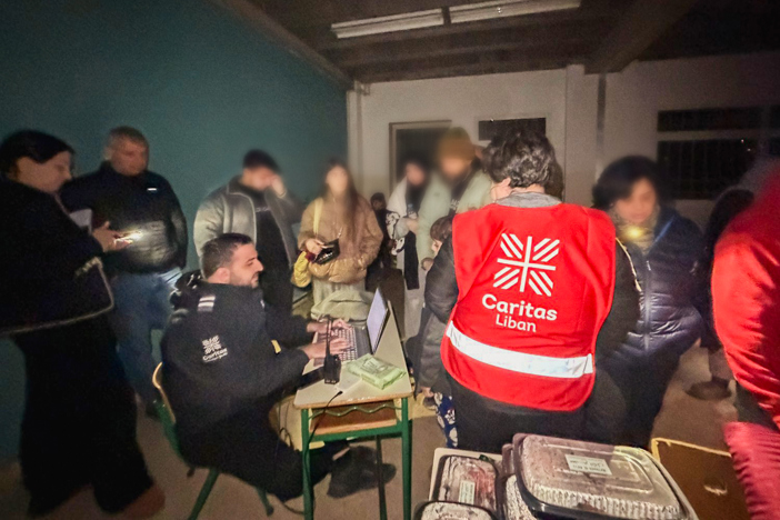 Caritas unpacking aid in Lebanon to distribute to vulnerable communities during emergency in the Middle East photo credit Caritas Lebanon.jpg