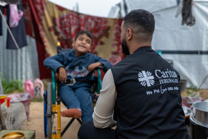 Caritas Jerusalem Visits A Young Boy Living With Disability In A Displacement Camp In Gaza Who Is Impacted By The Ongoing Conflict Photo Credit Trocaire