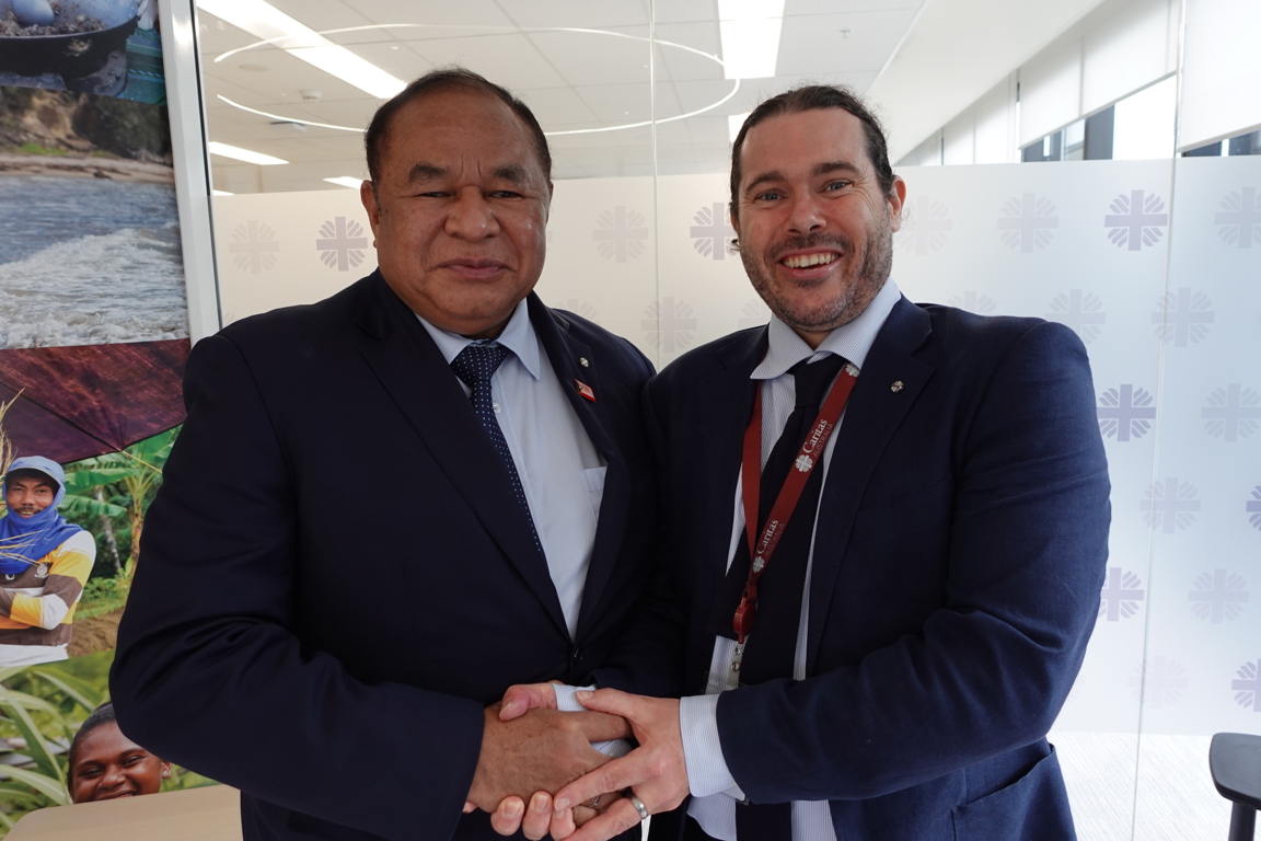 Minister for Foreign Affairs His Excellency Bendito dos Santos Freitas and Dan Skehan Programs Director at Caritas Australia.JPG