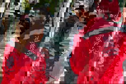 Caritas Lebanon Youth load aid supplies into a van March 2026 photo Credit Caritas Lebanon.jpg