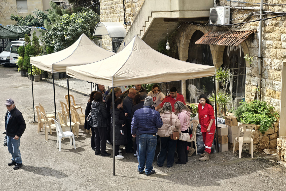 Families registering for aid with Caritas Lebanon photo credit Caritas Lebanon.jpg