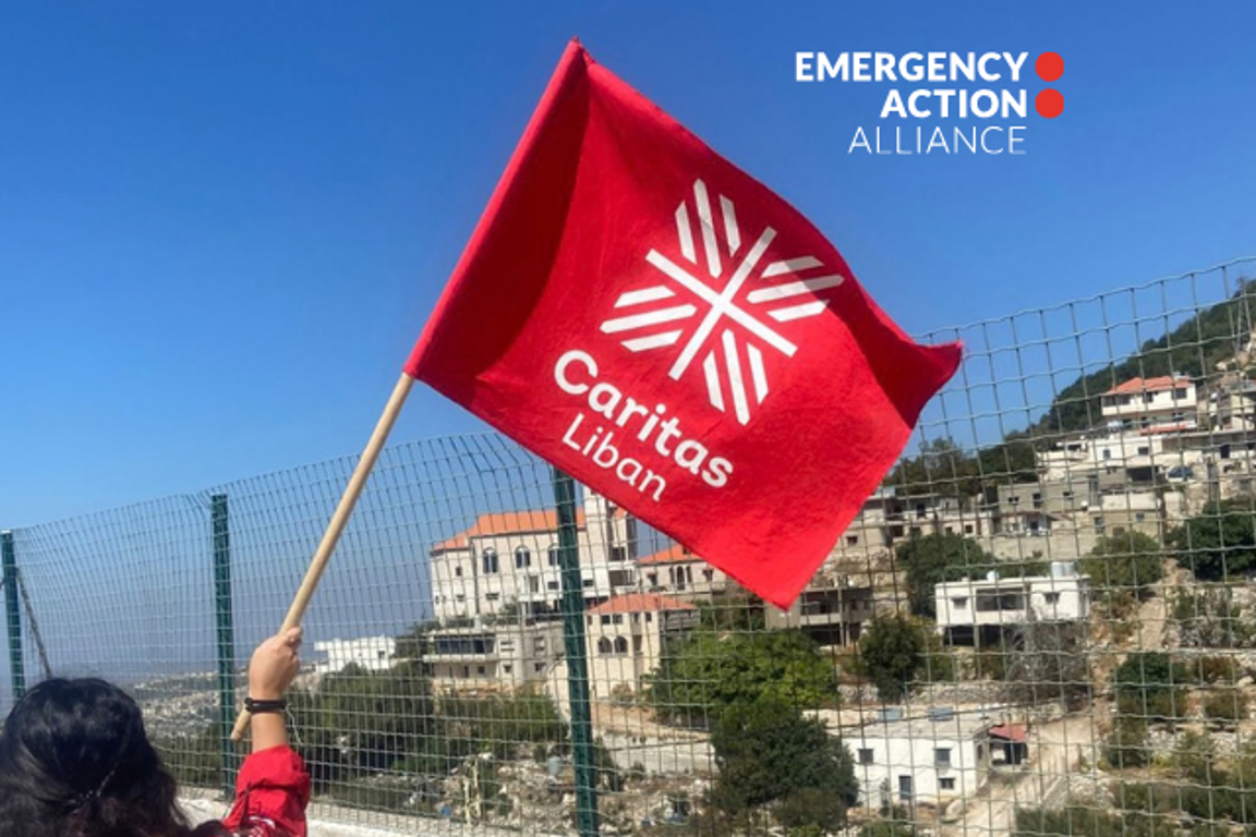 caritas-lebanon-waving-a-flag-photo-credit-caritas-lebanon.png (2)