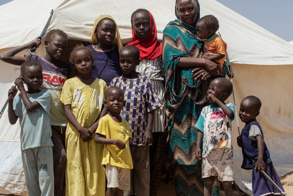 Nadia and her family in a camp in Sudan. Photo credit: George Wambugu/CAFOD (4)