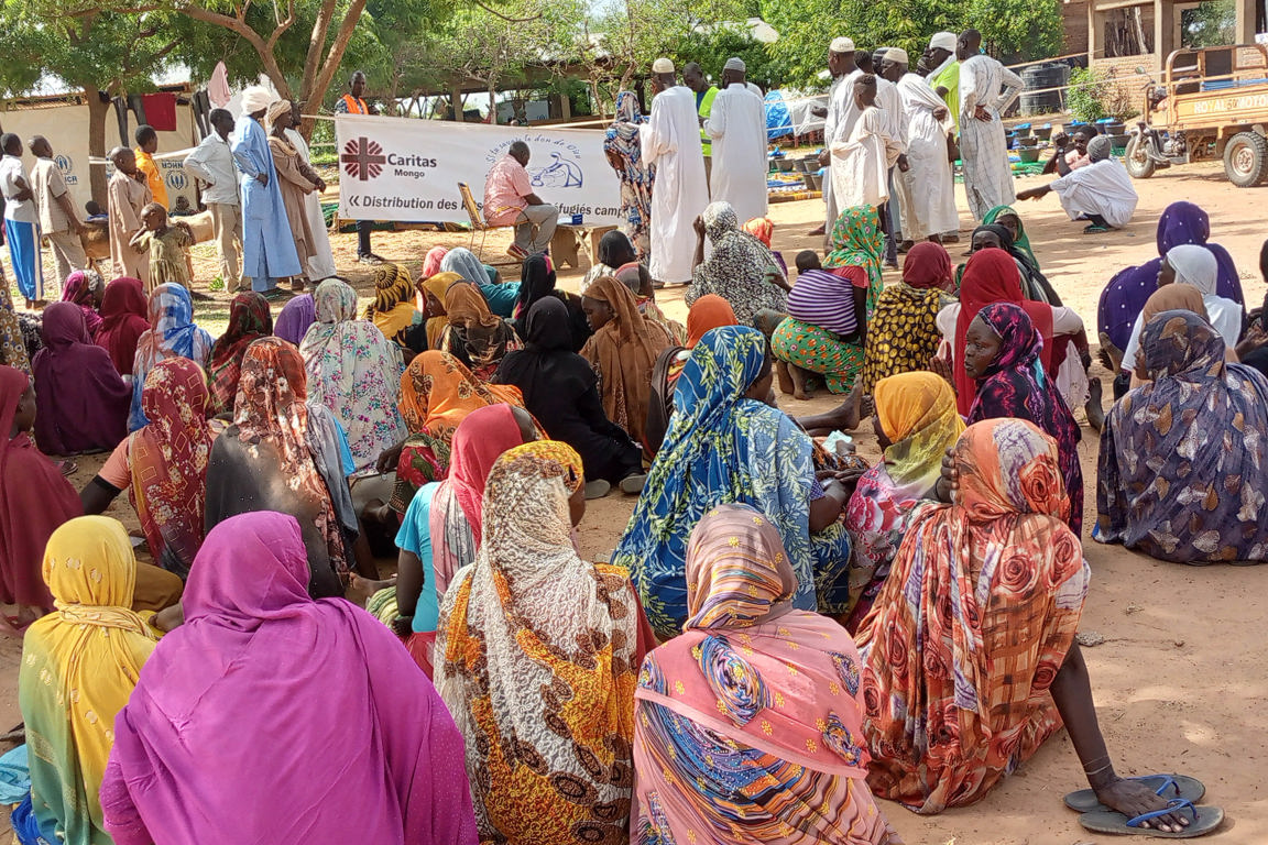 Aid Distribution At A Transit Camp For Sudanese Refugees In Chad Photo Credit Caritas Mongo Copy