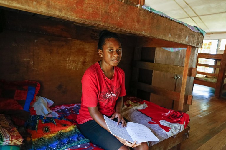 Shaniella is seen in her dormitory at a Rural Training Centre near the capital Honiara, Solomon Islands. Photo: Neil Nuia/Caritas Australia