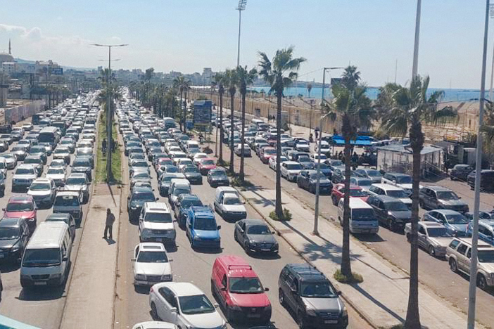 Families line up in their cars as evacuation orders hit photo credit Caritas Lebanon.jpg