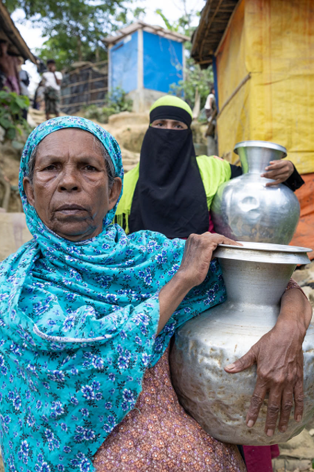 Sakhina Carrying Water