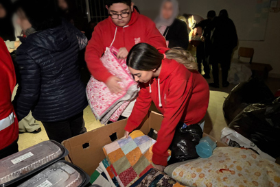 Caritas aid workers packing bedding on the 2nd of March photo credit Caritas Lebanon.jpeg