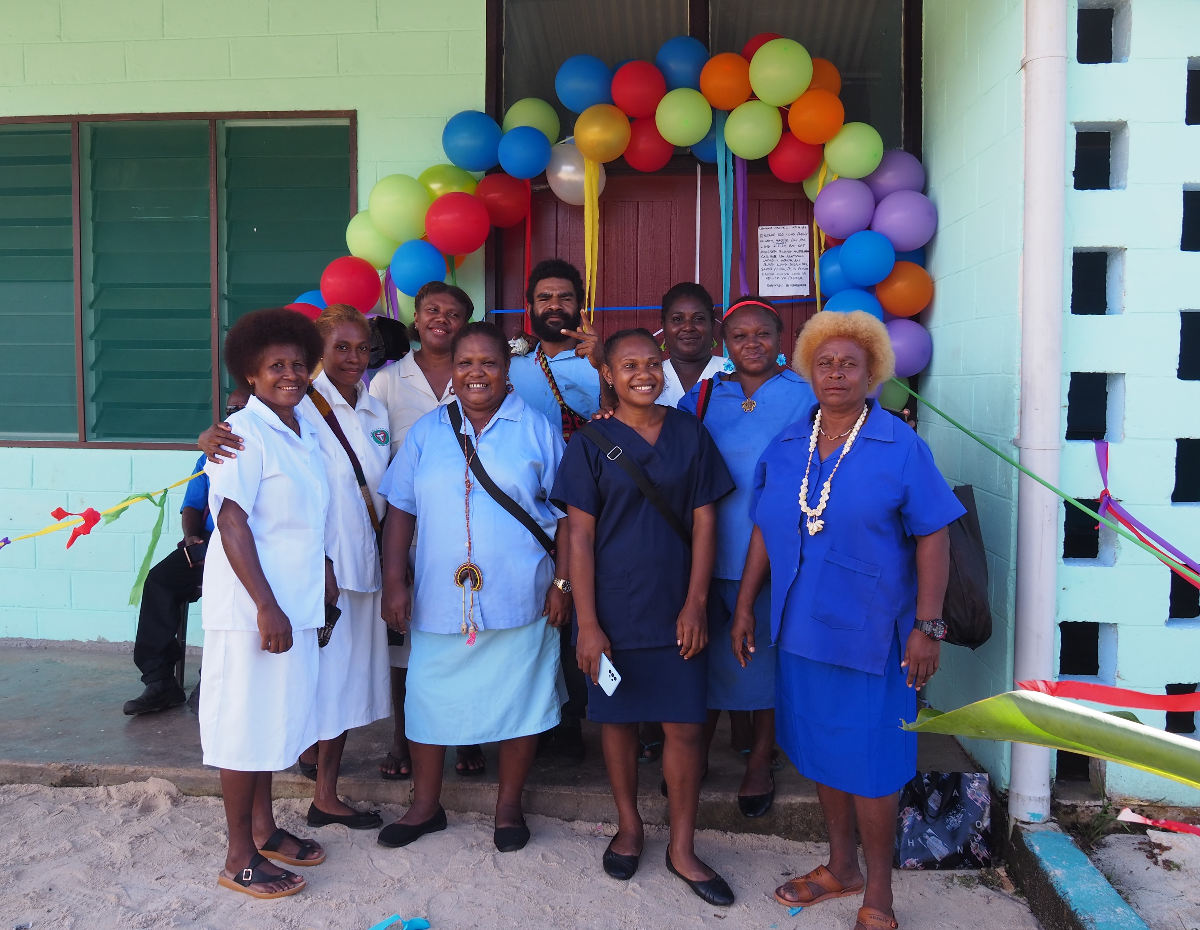 Matron Florence Copland With Staff From Lemakot Health Centre At A Reopening Ceremony Following The Completion Of A New Roof Photo Credit Caritas Australia