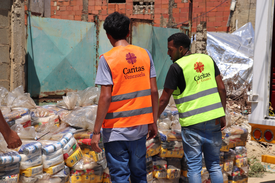 Caritas Team prepare to deliver supplies 
