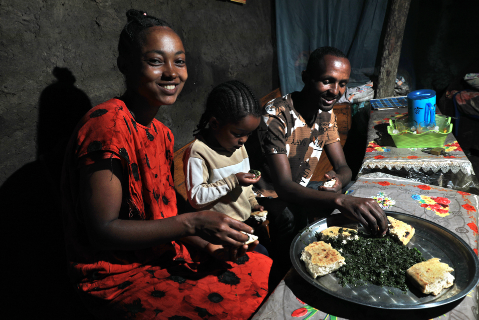 Yeshareg Eating With Her Family
