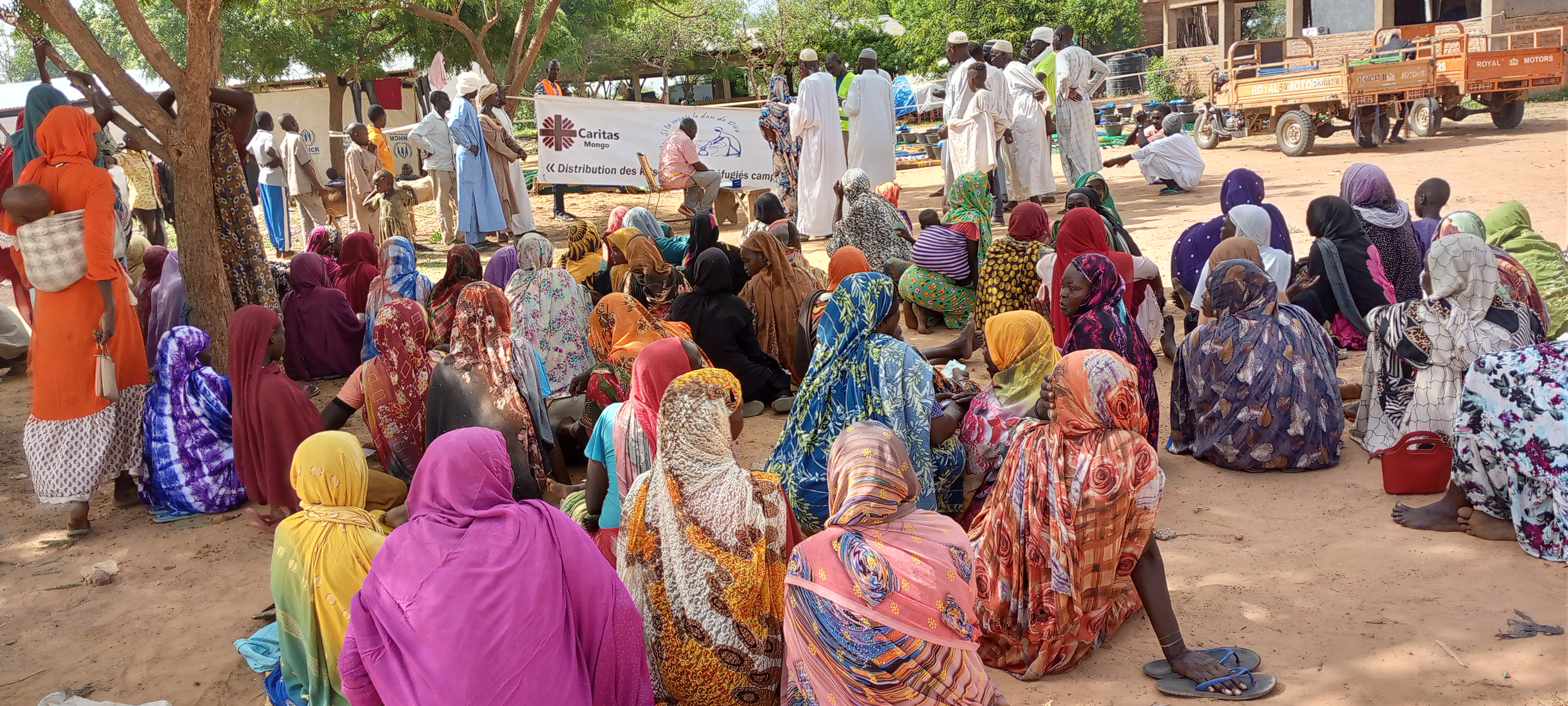 Aid Distribution At A Transit Camp For Sudanese Refugees In Chad Photo Credit Caritas Mongo