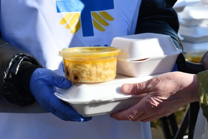 Caritas Ukraine staff hand out food parcels as part of the humaniatrian response photo credit Caritas Ukraine.jpg