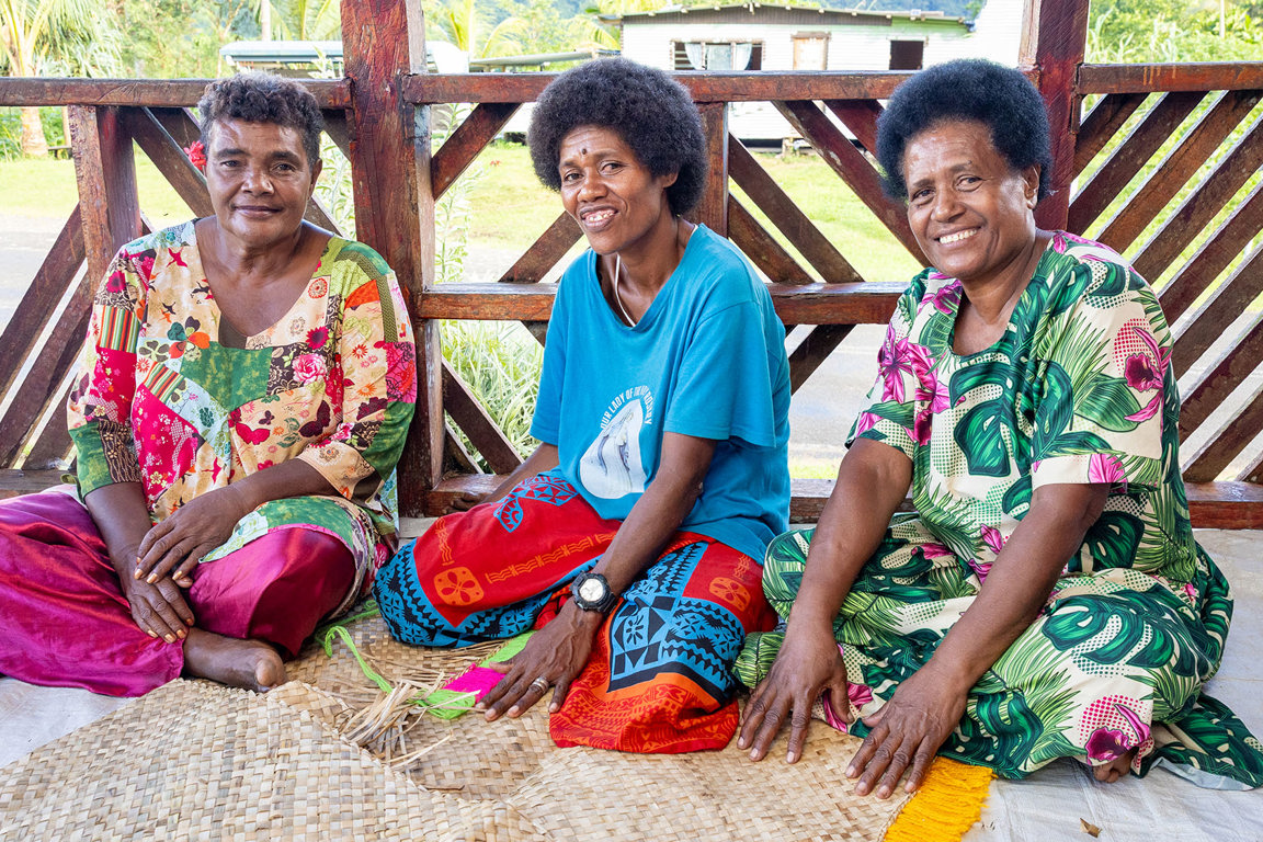 Manaini With Community Members