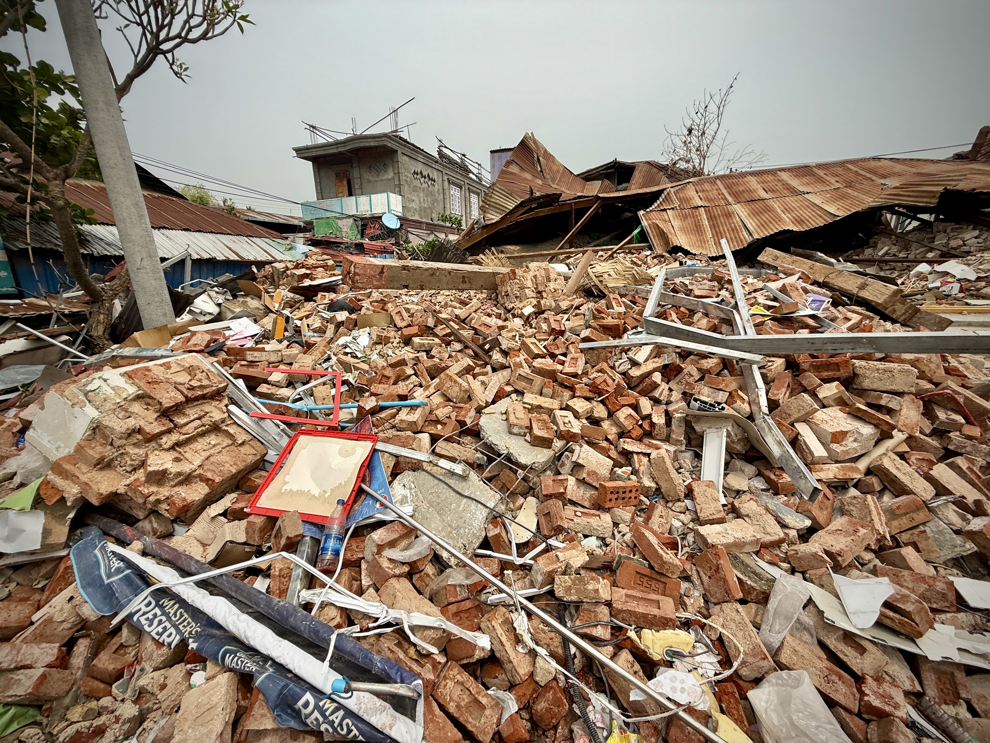 Rubble In A Town Following The Myanmar Earthquake Photo Credit Benny Manser For Caritas