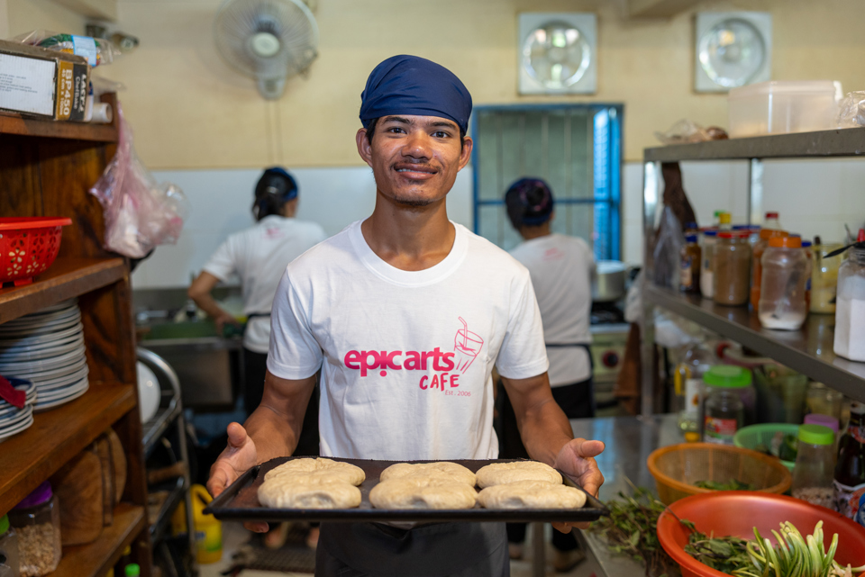 Reaksmey Making Bagels At Epic Arts Cafe