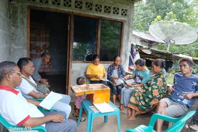 Photo #3_ Adelia attending a regular HAROHAN savings and loans group meeting in.jpeg