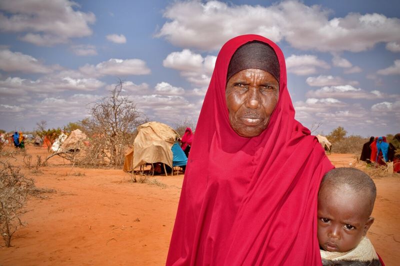 Village chief Abdyia and her 18-month-old great grandson, Mohammed, in an Internally Displaced Persons camp in Gedo district, southern Somalia.