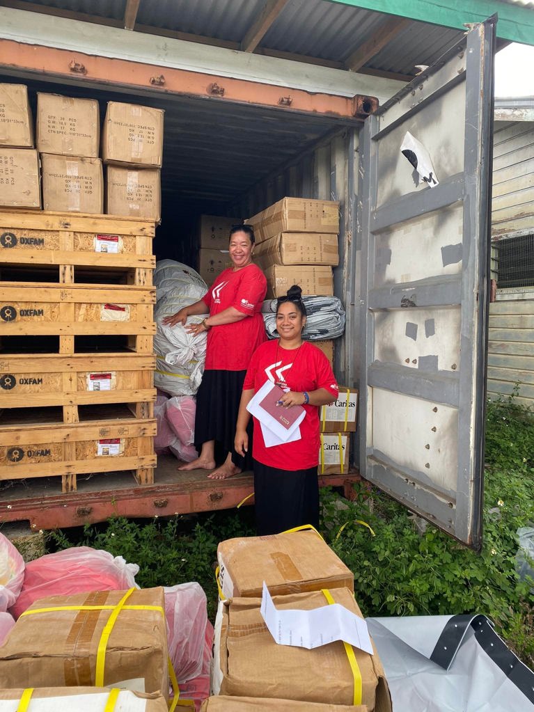 Caritas Tonga staff pre-positioning supplies. Photo credit: Caritas Tonga