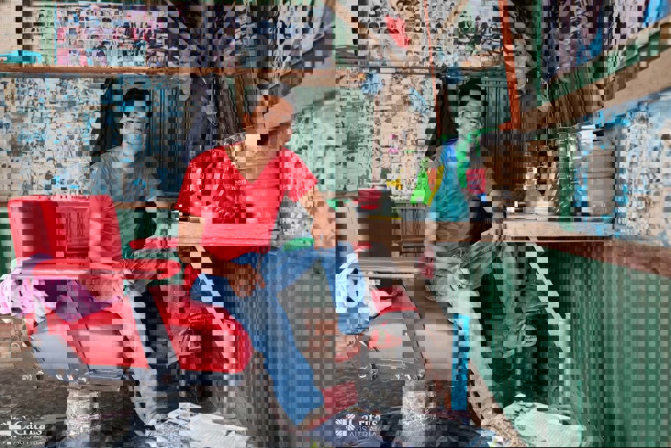 Rattanak at his barber shop