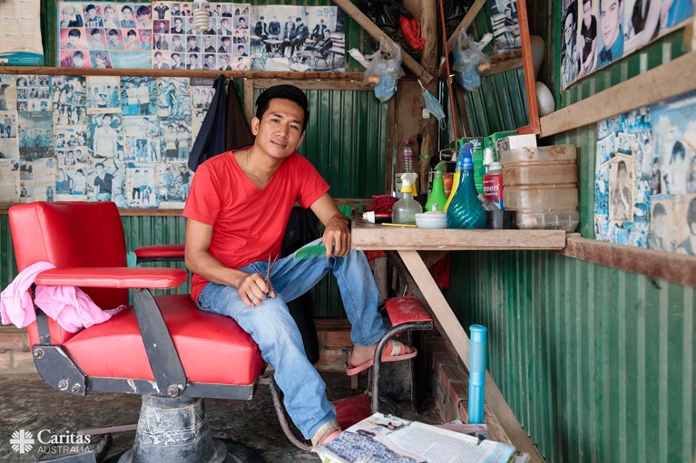 Rattanak now works as a barber and is a respected member of his community. Photo: Richard Wainwright.