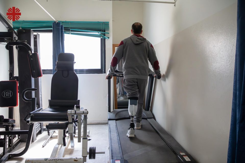 A Man On A Treadmill Working On Physiotherapy Following The Fitting Of An Artificial Limb Photo Credit Caritas Jerusalem