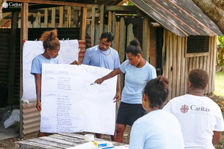 DRR Students and Shaniella at school in a remote village in the Solomon Islands. Credit: Neil Nuia