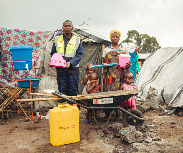 Sibomana and his family in an IDP camp. Photo: Bitita Dany/Caritas Goma