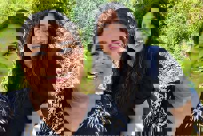 Two smiling women