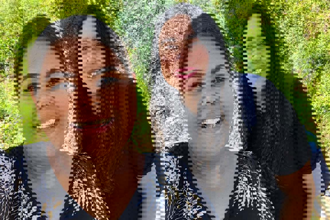 Two smiling women