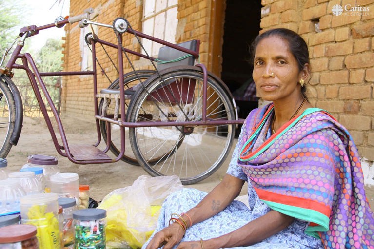 Sakun was able to access a custom-made tricyle and can now run her own business. Photo: Patrick Hansda.