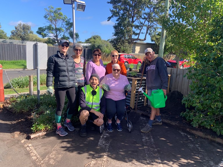 Earthcarers at St Mary of the Cross Parish, Mordialloc and Aspendale, Victoria work together on their herb garden, which is located beside the footpath for parishioners and passers-by to enjoy. Photo: St Mary of the Cross Parish
