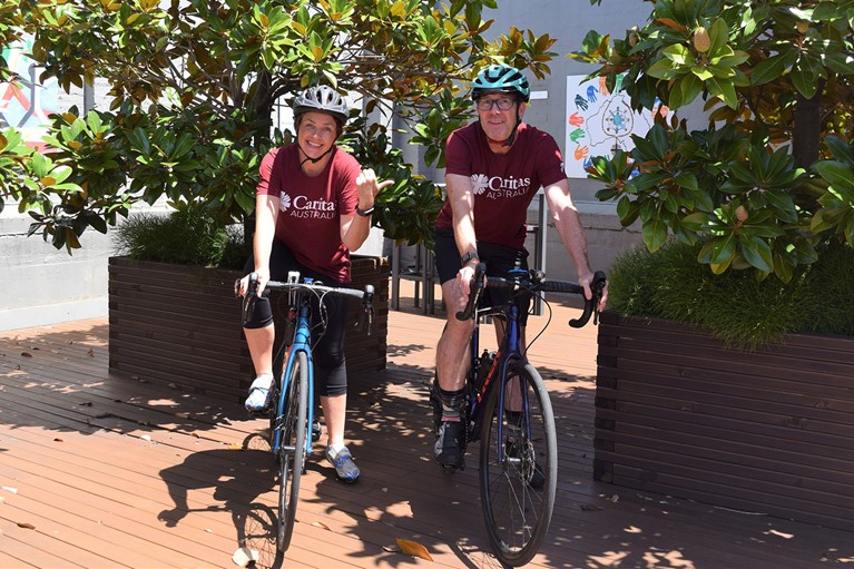 Kirsty Robertson, CEO of Caritas Australia, and Richard Landels, Advancement Director preparing for their ride. Photo credit: Claire Deakin/Caritas Australia.
