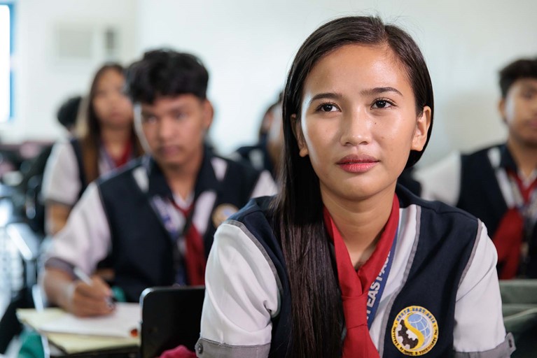 Ronita (22) in class in Quezon City, Philippines. Photo: Richard Wainwright/Caritas Australia 
