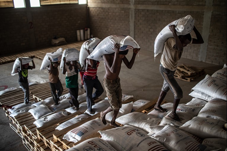 Emergency food assistance of wheat, legumes and cooking oil to food insecure families. Photo: CRS 