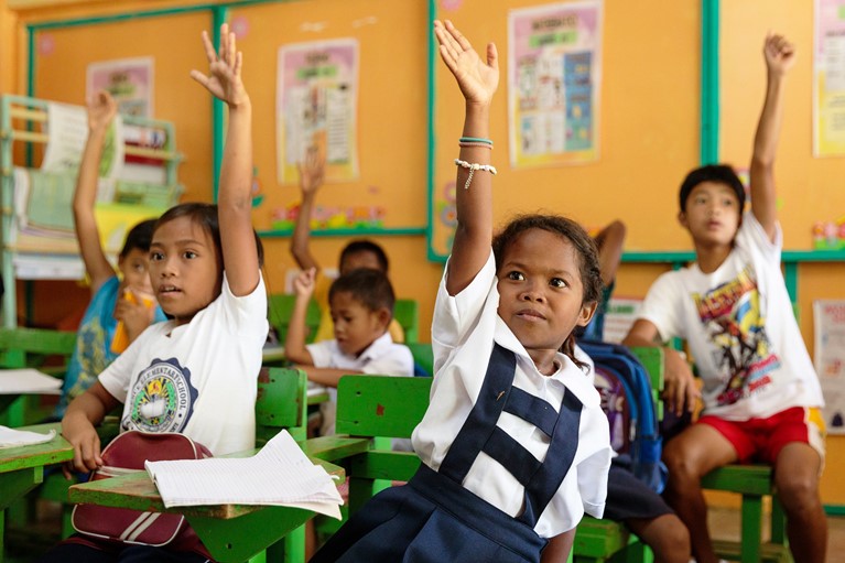 Angel (8) is seen during lessons at her local school close to her Manide community in Camarines Norte, the Philippines, 2019. Photo credit: Richard Wainwright/Caritas Australia.