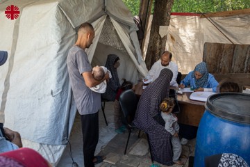 A Family Receives Humnaitarian Support In Gaza Photo Credit Caritas Jerusalem