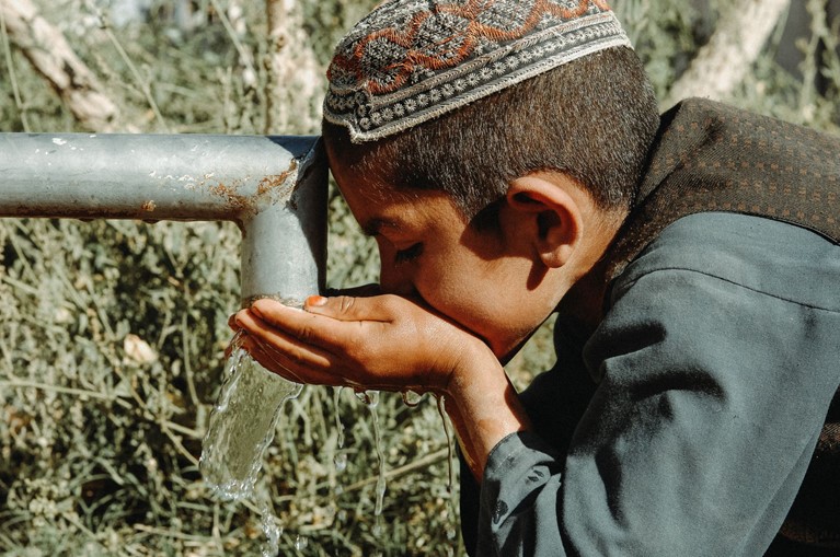Child at a well, Tarin Kowt, Uruzgan, Afghanistan, 2009. Photo: Lorrie Graham