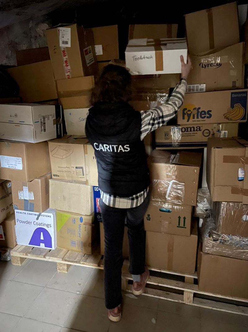 Caritas Volunteer Unpacking Goods In Chernivtsi. Photo Caritas Ukraine