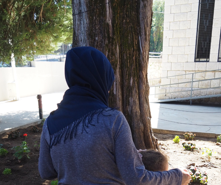 Noor (pseudonym used) at the women's shelter in Beirut. Photo: Nicole Chehine/Caritas Australia