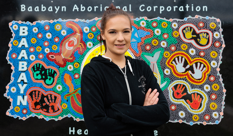 Tereesa outside Baabayn Aboriginal Corporation in western Sydney. Photo: Richard Wainwright/Caritas Australia