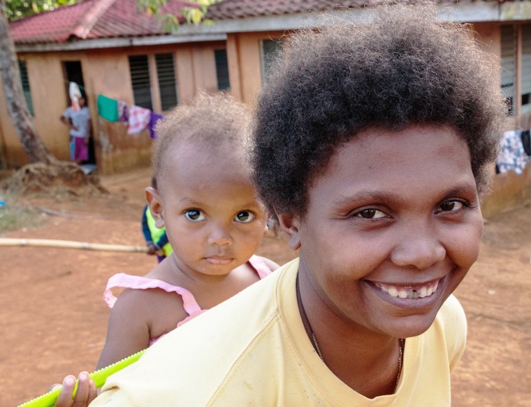 A mother and her child from the Manide community in the Philippines. Photo credit: Richard Wainwright/Caritas Australia.